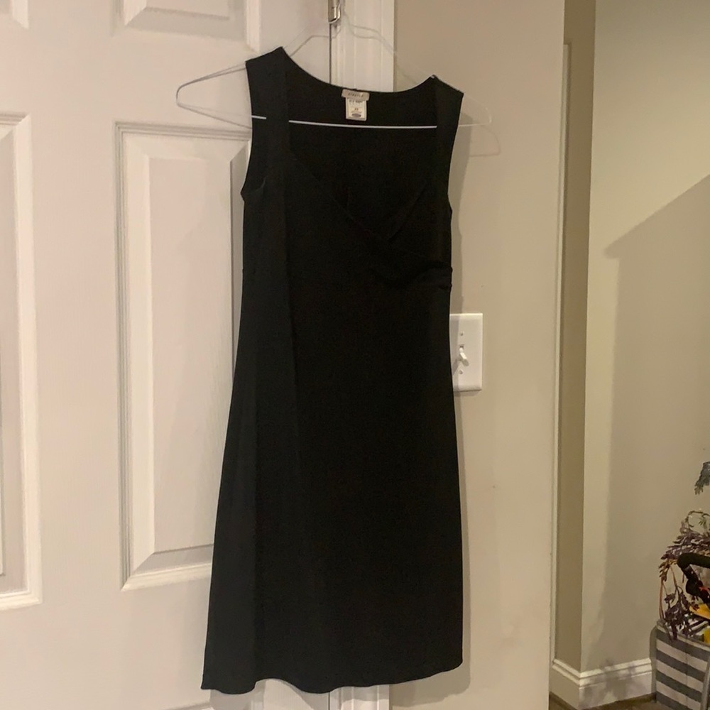 Your staple black cocktail dress.  Wore it for years and then I had children.